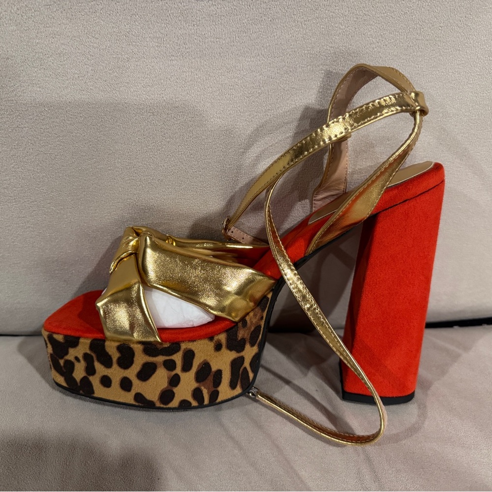 Brand new, never worn Up2Step funky and fabulous platform heels.
